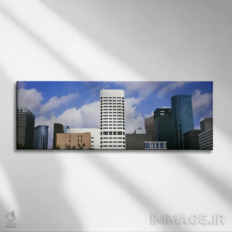تابلو دکوراتیو نمای پایین از ساختمان ها در یک شهر، برج وج، ساختمان اکس… اثر پانورامیک ایمجز - نمای روبهرو روی دیوار