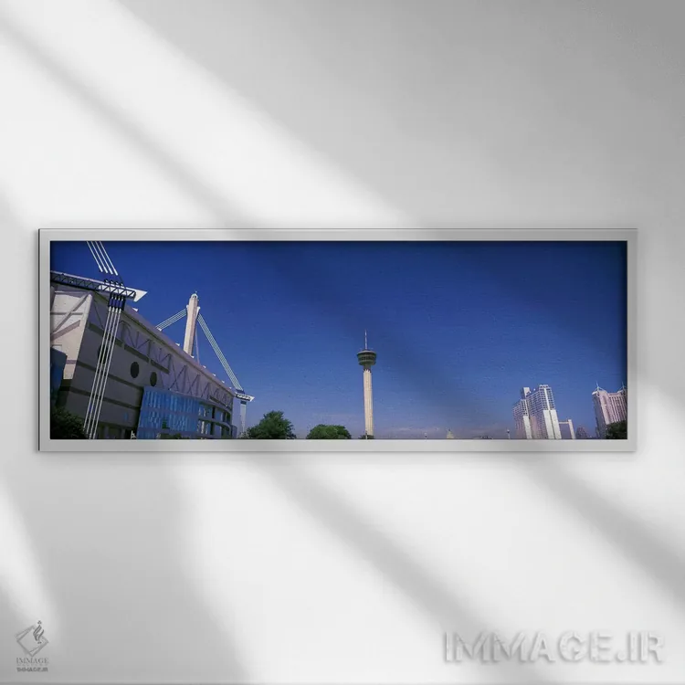تابلو دکوراتیو ساختمان ها در یک شهر، آلامودوم، برج قاره ها، هتل ماریت… اثر پانورامیک ایمجز - نمای قابدار سفید