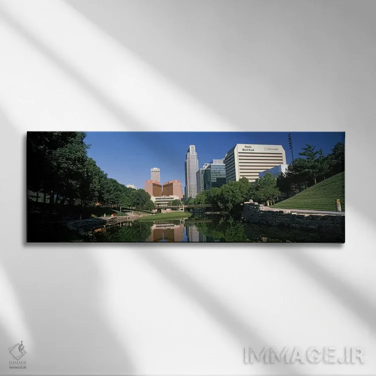 تابلو دکوراتیو ساختمان ها در کنار آب، ساختمان کوئست، اوماها، نبراسکا… اثر پانورامیک ایمجز - نمای روبهرو روی دیوار