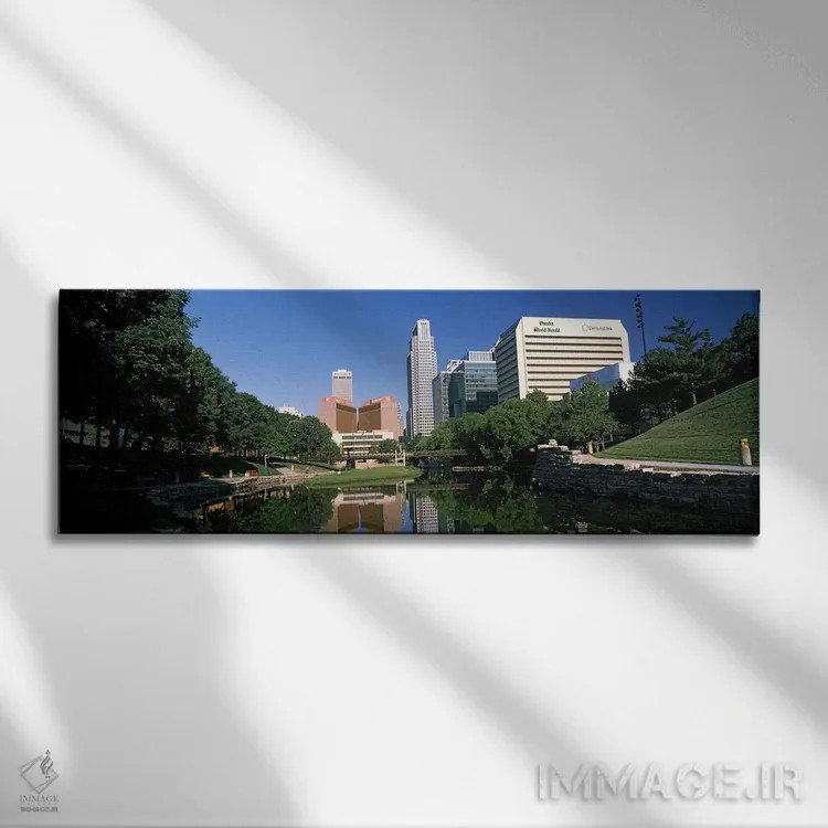 تابلو دکوراتیو ساختمان ها در کنار آب، ساختمان کوئست، اوماها، نبراسکا… اثر پانورامیک ایمجز - نمای روبهرو روی دیوار