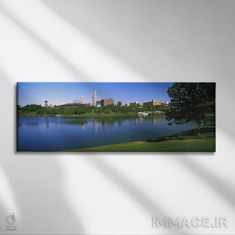تابلو دکوراتیو ساختمان ها در کنار آب، اوماها، نبراسکا، ایالات متحده آم… اثر پانورامیک ایمجز - نمای روبهرو روی دیوار