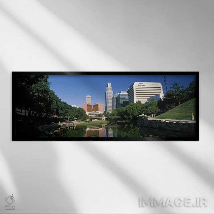 تابلو دکوراتیو ساختمان ها در کنار آب، ساختمان کوئست، اوماها، نبراسکا… اثر پانورامیک ایمجز - نمای قابدار مشکی