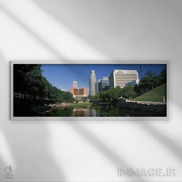 تابلو دکوراتیو ساختمان ها در کنار آب، ساختمان کوئست، اوماها، نبراسکا… اثر پانورامیک ایمجز - نمای قابدار سفید
