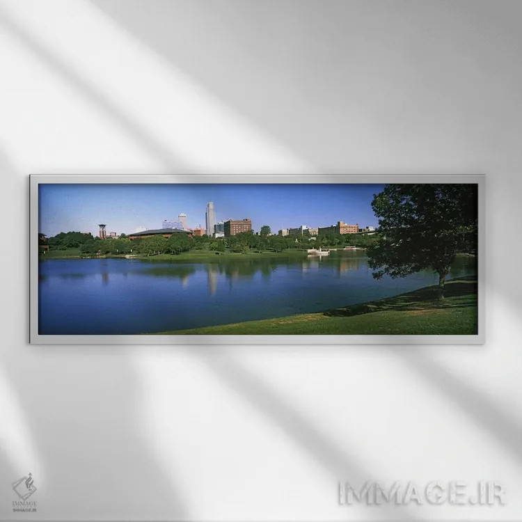 تابلو دکوراتیو ساختمان ها در کنار آب، اوماها، نبراسکا، ایالات متحده آم… اثر پانورامیک ایمجز - نمای قابدار سفید