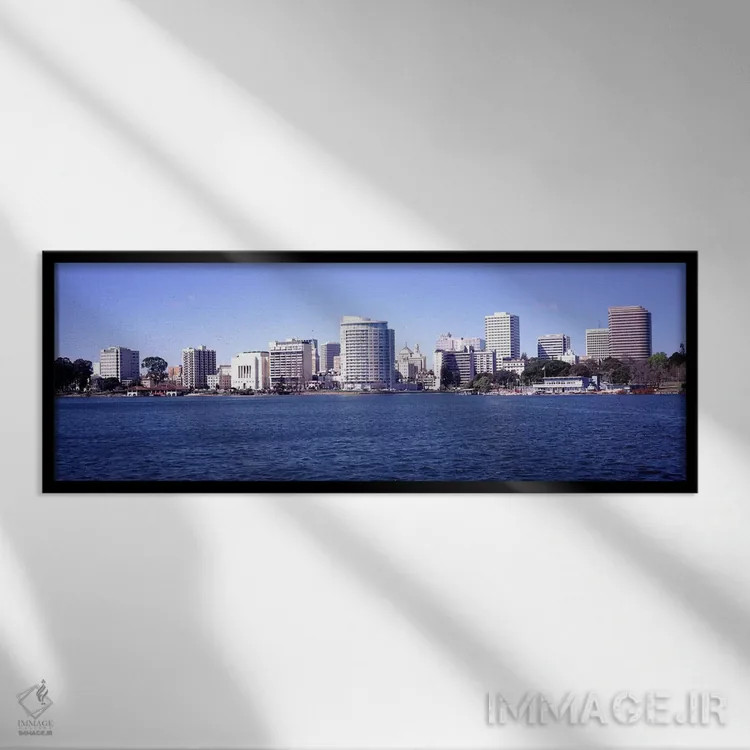 تابلو دکوراتیو Lake Merritt, Oakland, California, USA" - "آسمان خراش ه… اثر پانورامیک ایمجز - نمای قابدار مشکی