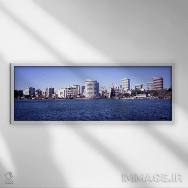 تابلو دکوراتیو Lake Merritt, Oakland, California, USA" - "آسمان خراش ه… اثر پانورامیک ایمجز - نمای قابدار سفید