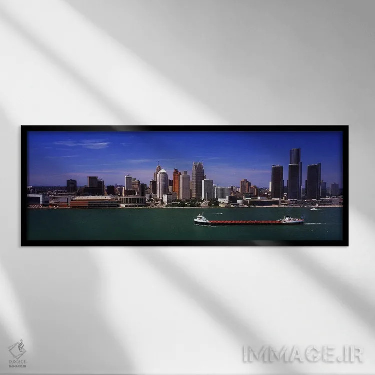تابلو دکوراتیو Detroit, Michigan, USA" - "ساختمان ها در کنار ساحل، دیت… اثر پانورامیک ایمجز - نمای قابدار مشکی