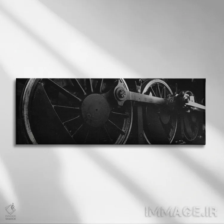 تابلو دکوراتیو چرخ های محرک لکوموتیو بخار در سیاه و سفید اثر پانورامیک ایمجز - نمای روبهرو روی دیوار