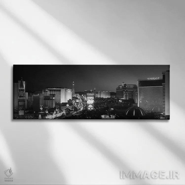 تابلو دکوراتیو ساختمان های روشن شده در شب، لاس وگاس، نوادا، ایالات متح… اثر پانورامیک ایمجز - نمای روبهرو روی دیوار