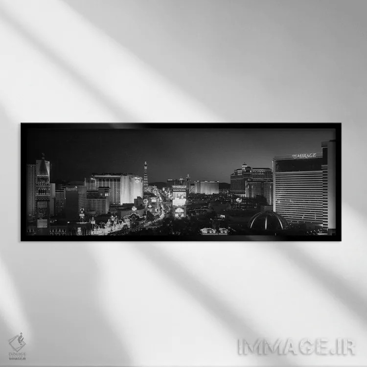 تابلو دکوراتیو ساختمان های روشن شده در شب، لاس وگاس، نوادا، ایالات متح… اثر پانورامیک ایمجز - نمای قابدار مشکی