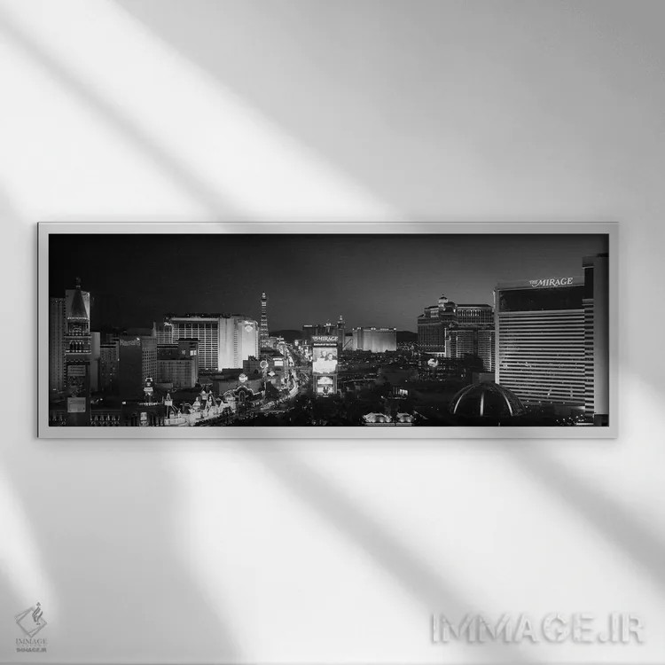 تابلو دکوراتیو ساختمان های روشن شده در شب، لاس وگاس، نوادا، ایالات متح… اثر پانورامیک ایمجز - نمای قابدار سفید