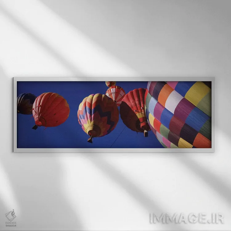 تابلو دکوراتیو نمای کم زاویه از بالن های هوای گرم در آسمان، کلرادو، ای… اثر پانورامیک ایمجز - نمای قابدار سفید
