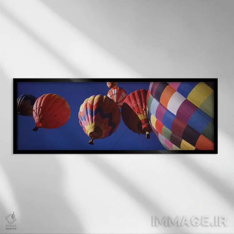 تابلو دکوراتیو نمای کم زاویه از بالن های هوای گرم در آسمان، کلرادو، ای… اثر پانورامیک ایمجز - نمای قابدار مشکی