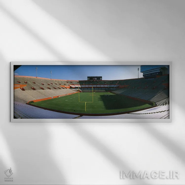 تابلو دکوراتیو نمای زاویه بلند از بازیکنان در یک زمین فوتبال، استادیوم… اثر پانورامیک ایمجز - نمای قابدار سفید