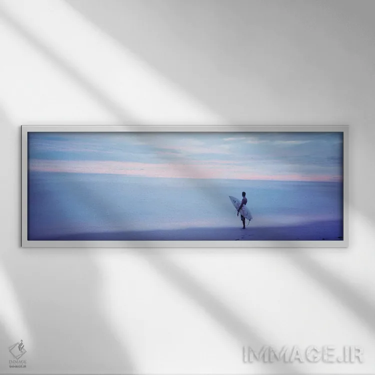 تابلو دکوراتیو مردی با تخته موج سواری در ساحل، کاستاریکا اثر پانورامیک ایمجز - نمای قابدار سفید