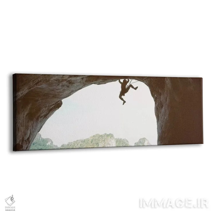 تابلو دکوراتیو سایه روشن مردی که در حال صعود از یک صخره است، ساحل رایل… اثر پانورامیک ایمجز - نمای پرسپکتیو محصول