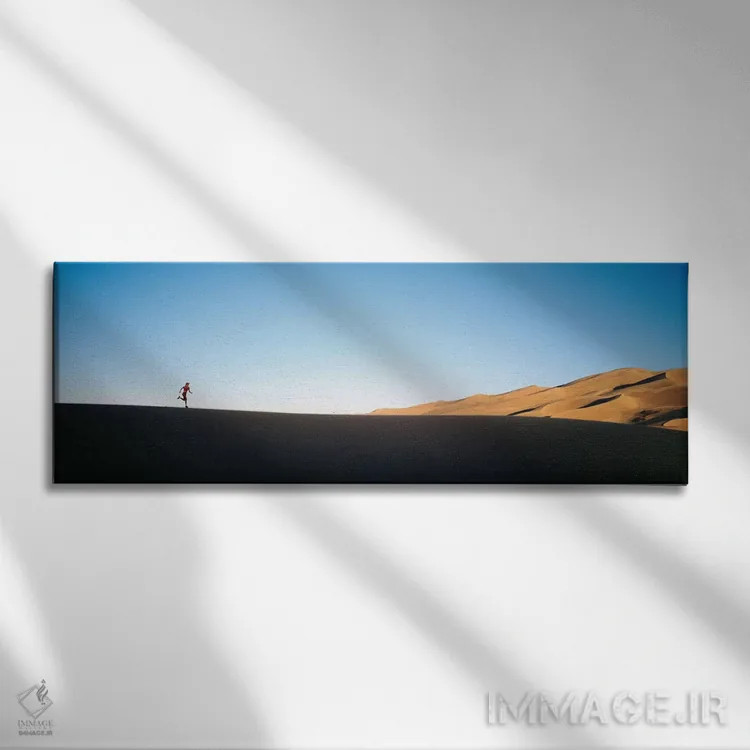 تابلو دکوراتیو نمای از زاویه پایین از زن در حال دویدن در صحرای، یادبود… اثر پانورامیک ایمجز - نمای روبهرو روی دیوار