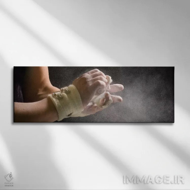 تابلو دکوراتیو ژیمناست مرد در حال گذاشتن گچ روی دست های خود ۵، جزیره ب… اثر پانورامیک ایمجز - نمای روبهرو روی دیوار