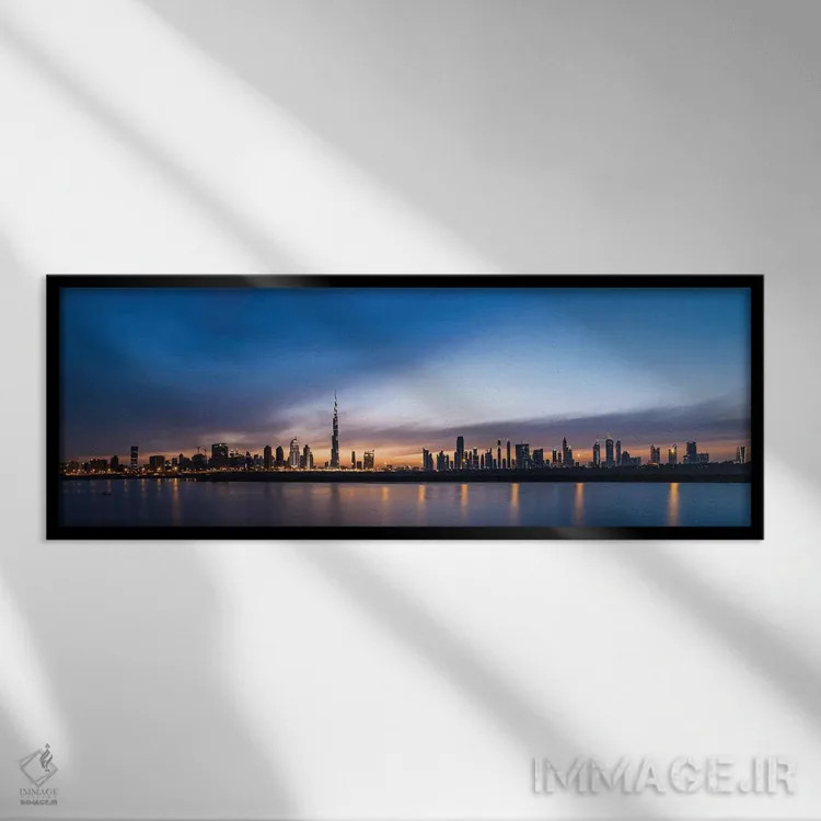 تابلو دکوراتیو Dubai, United Arab Emirates" - "خط افق مرکز شهر در غروب… اثر پانورامیک ایمجز - نمای قابدار مشکی