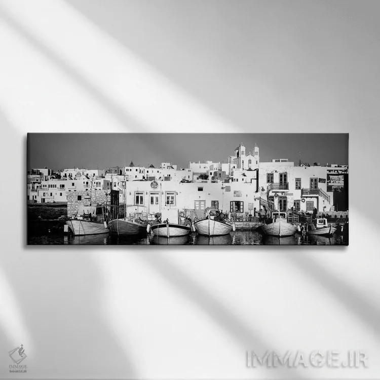 تابلو دکوراتیو "قایق ها در کنار آب، پاروس، جزایر سیکلاد، یونان" اثر پانورامیک ایمجز - نمای روبهرو روی دیوار