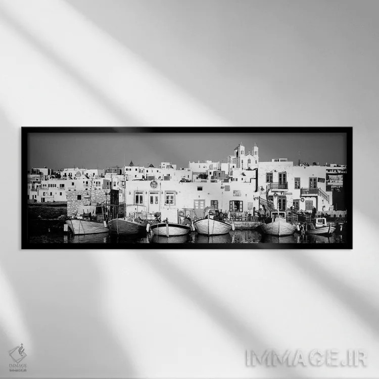 تابلو دکوراتیو "قایق ها در کنار آب، پاروس، جزایر سیکلاد، یونان" اثر پانورامیک ایمجز - نمای قابدار مشکی