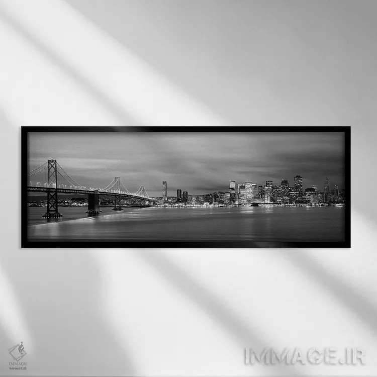تابلو دکوراتیو "پل روشن شده در هنگام غروب، پل خلیج، خلیج سان فرانسیسکو… اثر پانورامیک ایمجز - نمای قابدار مشکی