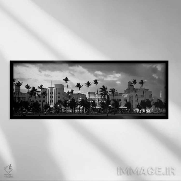 تابلو دکوراتیو "ساختمان ها روشن شده در هنگام غروب، اوشن درایو، میامی ب… اثر پانورامیک ایمجز - نمای قابدار مشکی