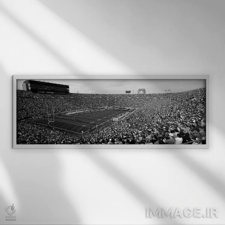 تابلو دکوراتیو "نمای بلند از یک استادیوم فوتبال پر از تماشاگران، ورزشگ… اثر پانورامیک ایمجز - نمای قابدار سفید