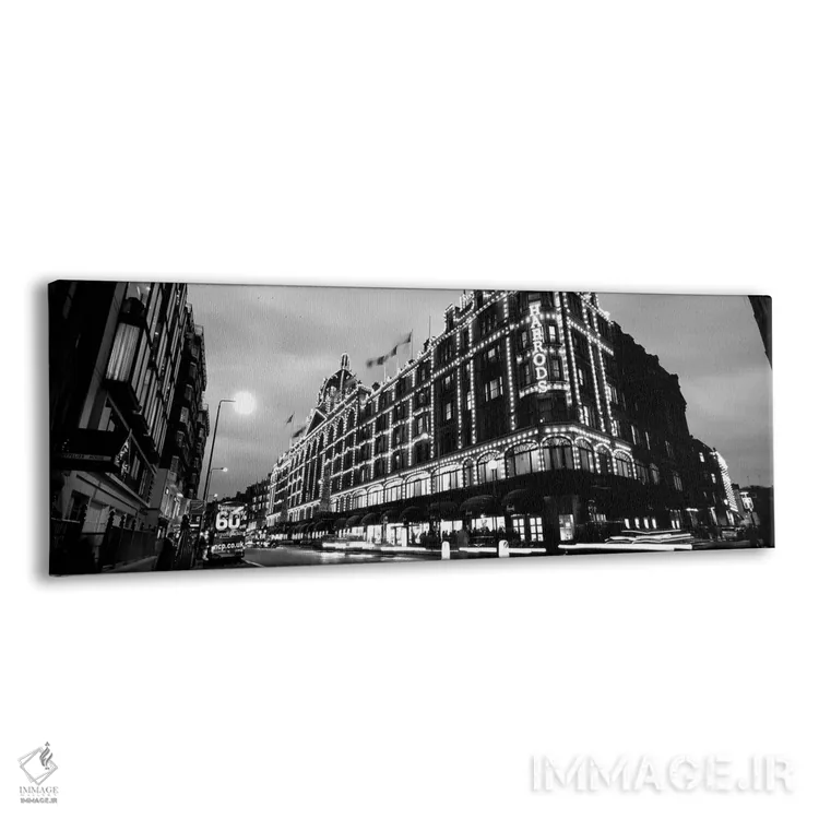 تابلو دکوراتیو "نمای زاویه پایین از ساختمان هایی که شب ها روشن است، ها… اثر پانورامیک ایمجز - نمای پرسپکتیو محصول