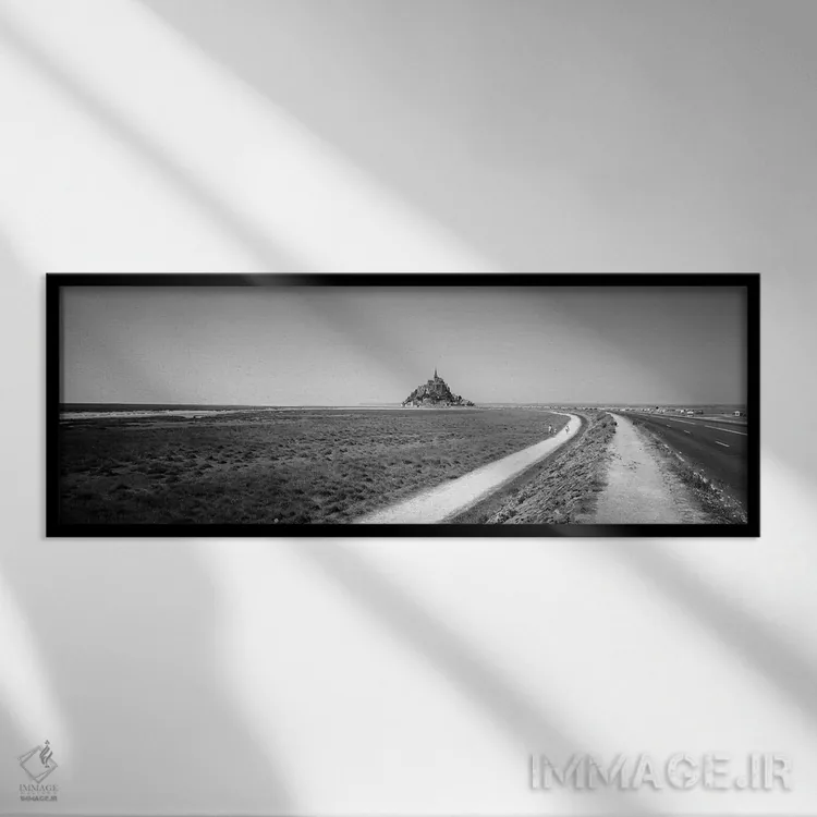 تابلو دکوراتیو "جاده ای که از یک چشم انداز عبور می کند، مون سن میشل، ن… اثر پانورامیک ایمجز - نمای قابدار مشکی