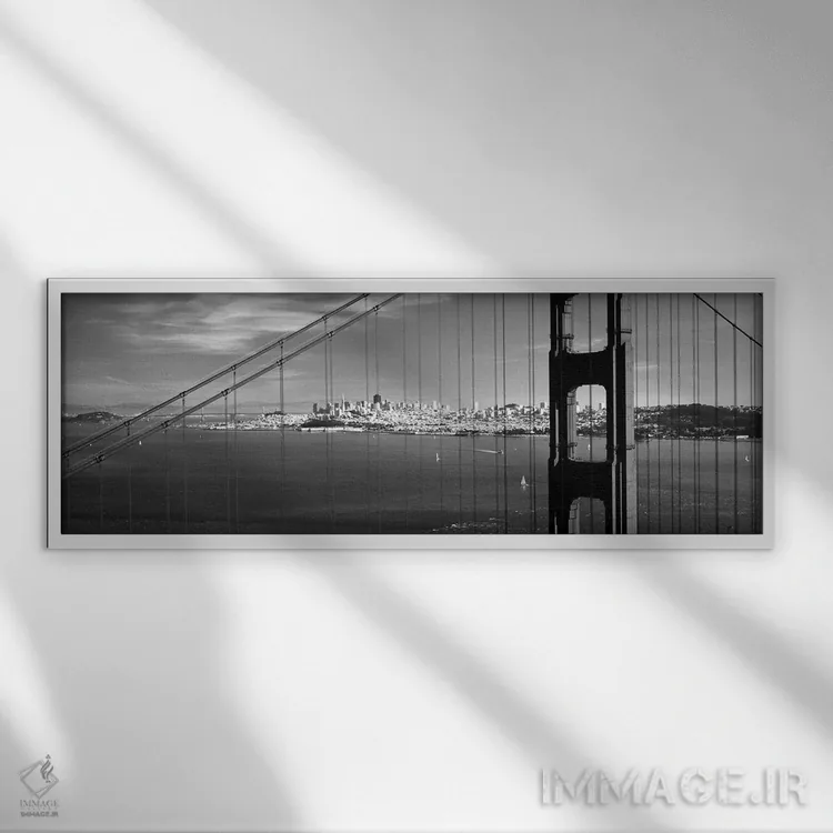 تابلو دکوراتیو "پل معلق با شهری در پس زمینه، پل دروازه طلایی، سانفرانس… اثر پانورامیک ایمجز - نمای قابدار سفید