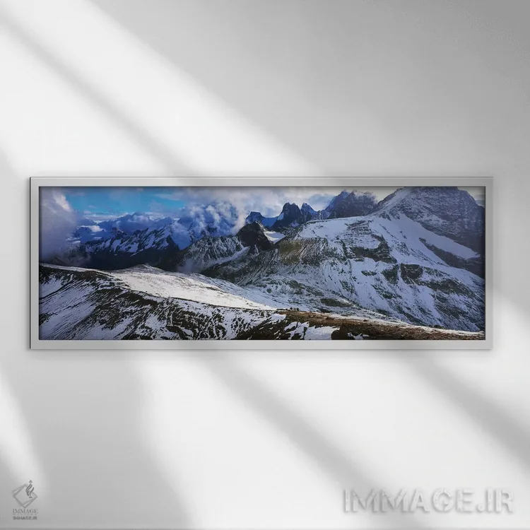 تابلو دکوراتیو رشته کوه های پوشیده از برف در برابر آسمان ابری، پارک اس… اثر پانورامیک ایمجز - نمای قابدار سفید