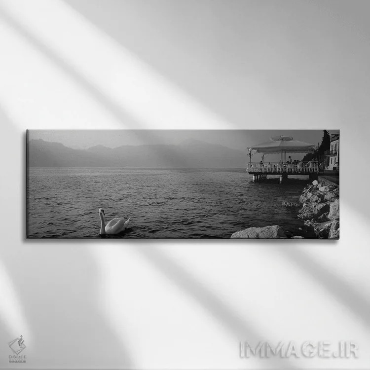 تابلو دکوراتیو گردشگر روی ایوان، دریاچه گاردای ایتالیا، تورری دل بناکو اثر پانورامیک ایمجز - نمای روبهرو روی دیوار