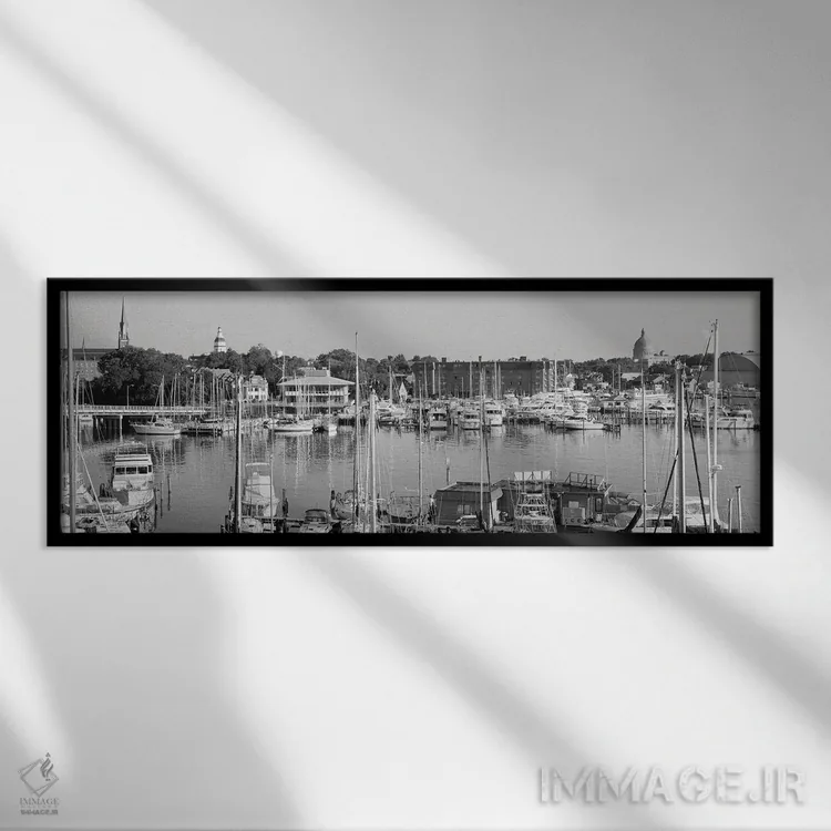 تابلو دکوراتیو نمایی از قایق های بادبانی در یک خلیج، آکادمی نیروی دریا… اثر پانورامیک ایمجز - نمای قابدار مشکی