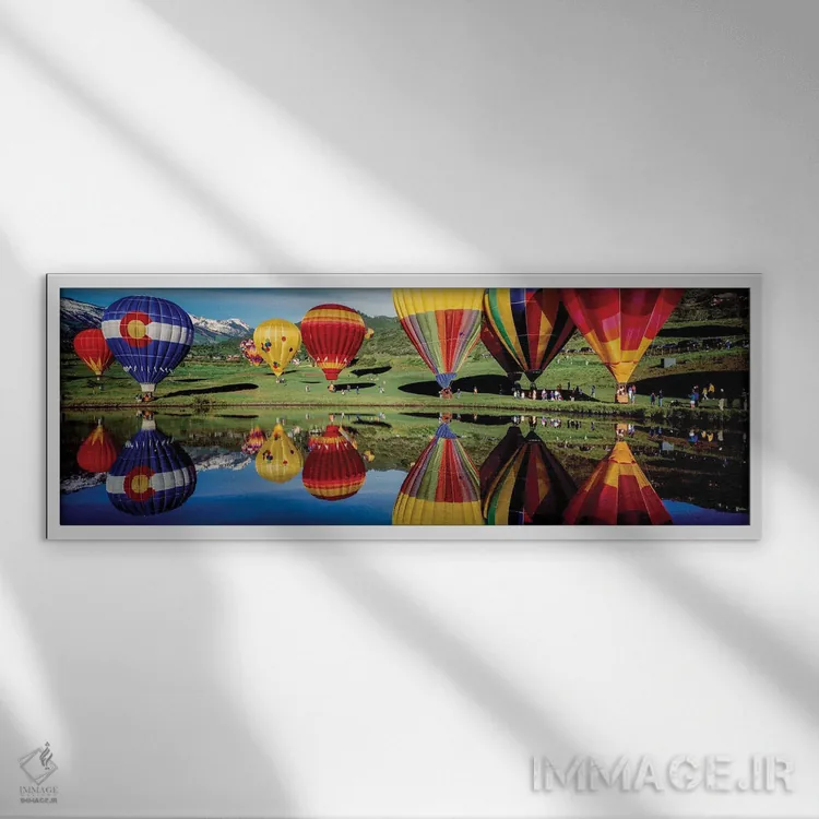 تابلو دکوراتیو انعکاس بالن های هوای گرم در یک دریاچه، دهکده اسنومس، شه… اثر پانورامیک ایمجز - نمای قابدار سفید