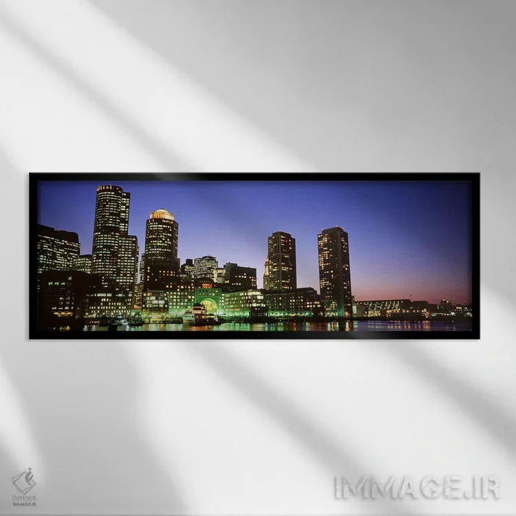تابلو دکوراتیو Boston, Massachusetts, USA,آسمان خراش های کنار آب روشن… اثر پانورامیک ایمجز - نمای قابدار مشکی