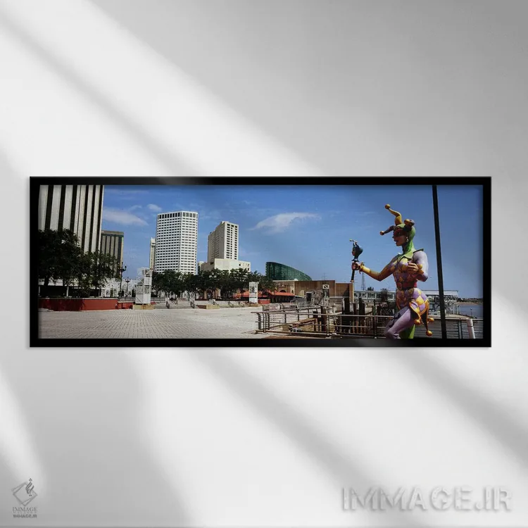 تابلو دکوراتیو Riverwalk Area, New Orleans, Louisiana, USA,مجسمه دلقک… اثر پانورامیک ایمجز - نمای قابدار مشکی