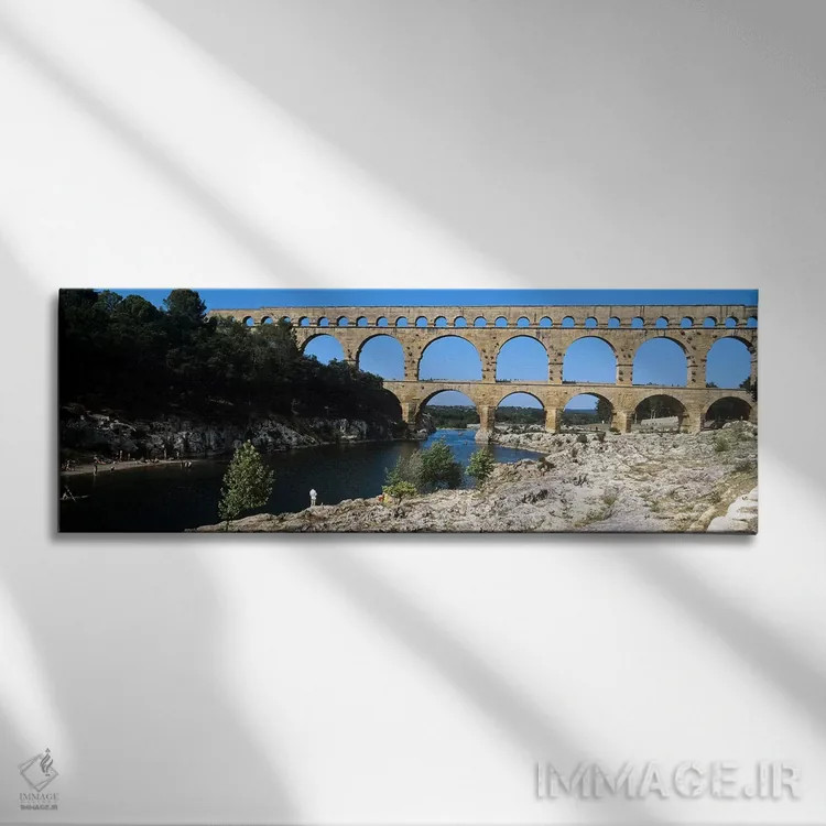 تابلو دکوراتیو Pont Du Gard, Nimes, Gard, Languedoc-Rousillon, France… اثر پانورامیک ایمجز - نمای روبهرو روی دیوار