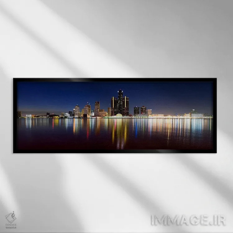 تابلو دکوراتیو Detroit, Michigan, USA,ساختمان ها در شهر روشن هنگام غرو… اثر پانورامیک ایمجز - نمای قابدار مشکی