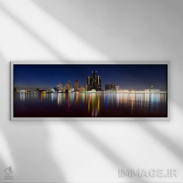 تابلو دکوراتیو Detroit, Michigan, USA,ساختمان ها در شهر روشن هنگام غرو… اثر پانورامیک ایمجز - نمای قابدار سفید