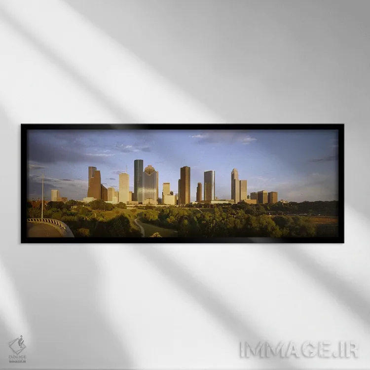 تابلو دکوراتیو Houston, Texas, USA,آسمان خراش ها در برابر آسمان ابری… اثر پانورامیک ایمجز - نمای قابدار مشکی