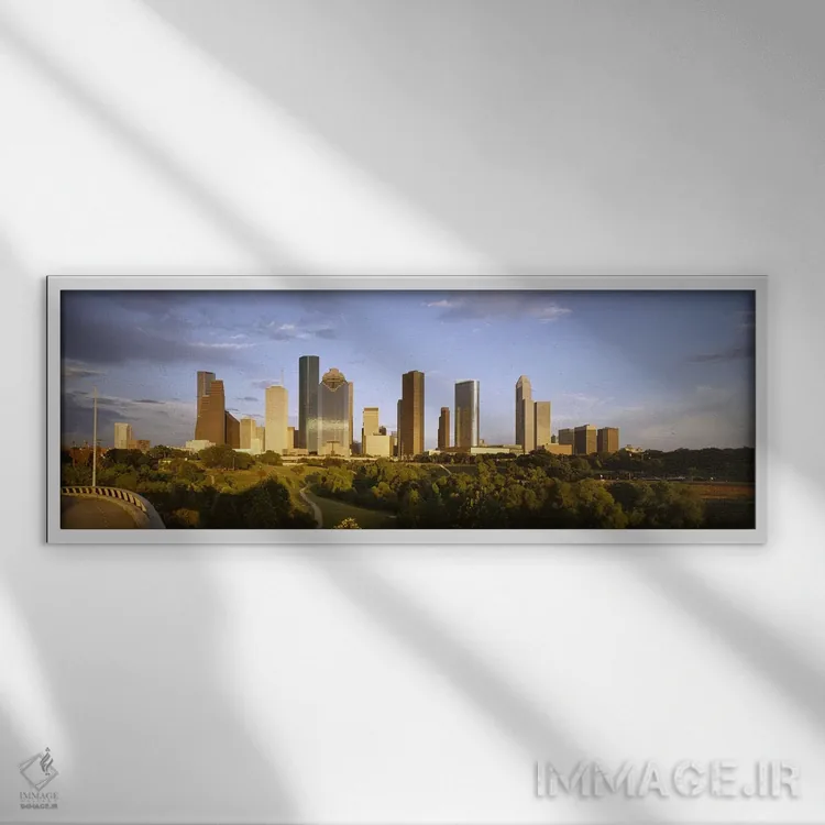 تابلو دکوراتیو Houston, Texas, USA,آسمان خراش ها در برابر آسمان ابری… اثر پانورامیک ایمجز - نمای قابدار سفید