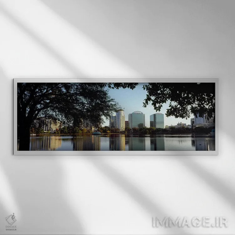 تابلو دکوراتیو Lake Eola, Orlando, Orange County, Florida, USA,ساختمان… اثر پانورامیک ایمجز - نمای قابدار سفید