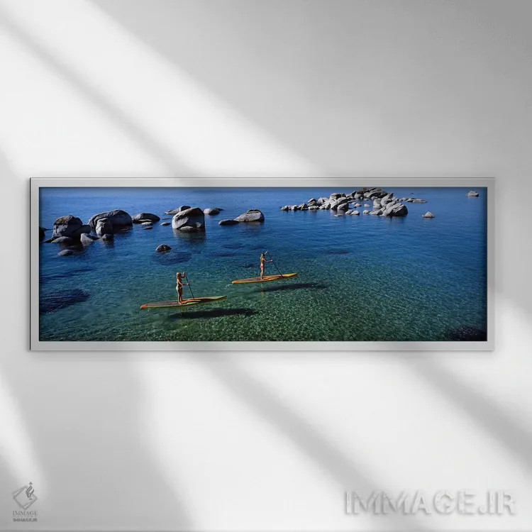 تابلو دکوراتیو Lake Tahoe, California, USA,دو زن در حال پارو زدن روی ب… اثر پانورامیک ایمجز - نمای قابدار سفید