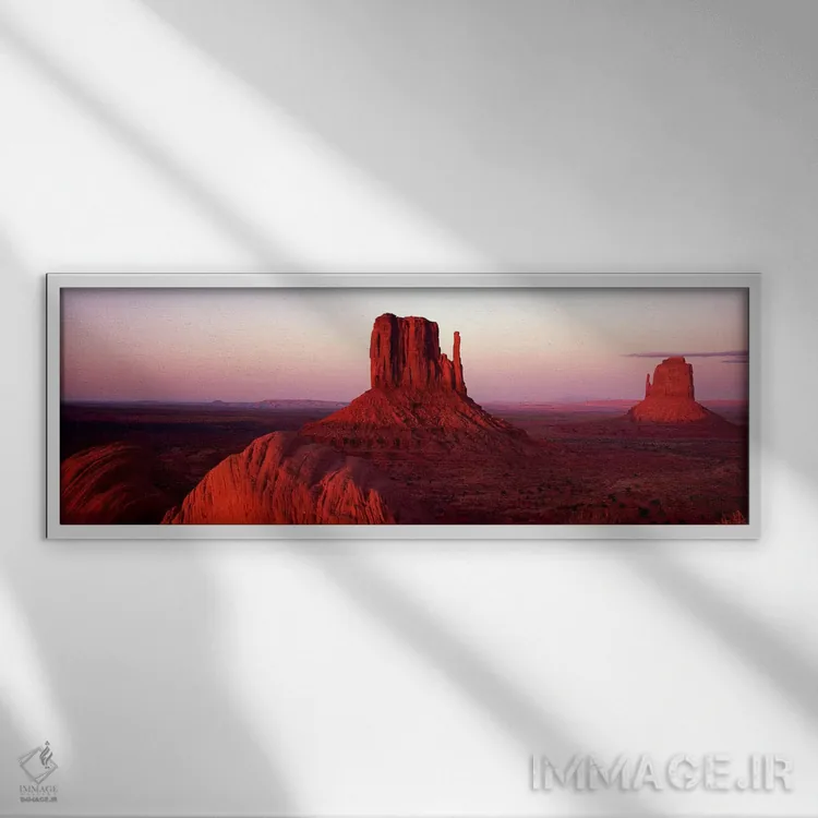تابلو دکوراتیو Monument Valley, Navajo Nation,غروب سرخ بر فراز میتن ها… اثر پانورامیک ایمجز - نمای قابدار سفید