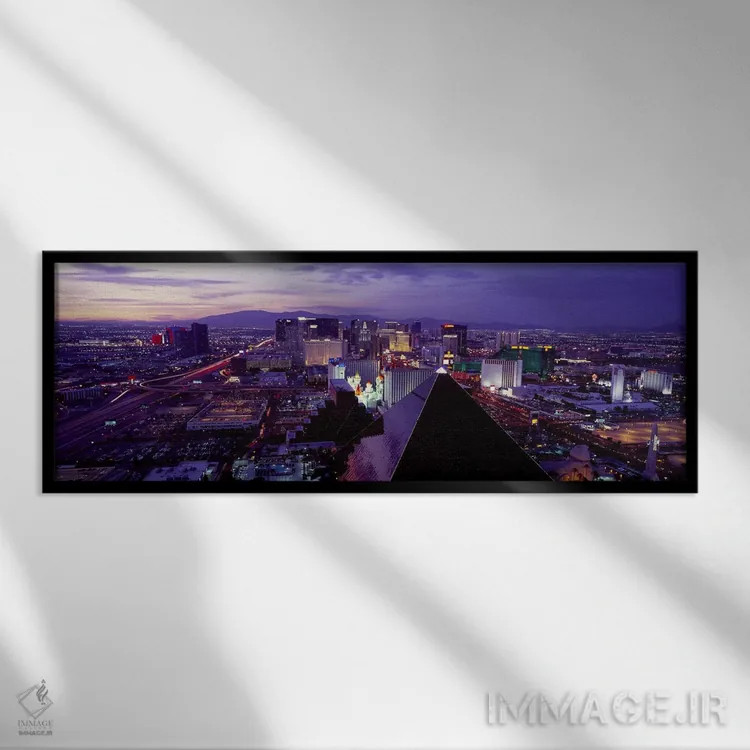 تابلو دکوراتیو Las Vegas, Clark County, Nevada, USA,شهر در حال روشنایی… اثر پانورامیک ایمجز - نمای قابدار مشکی