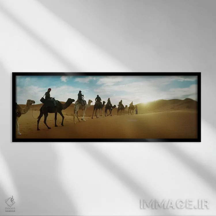 تابلو دکوراتیو Morocco #2,توریست ها سواره بر شتر از میان چشم انداز صحر… اثر پانورامیک ایمجز - نمای قابدار مشکی
