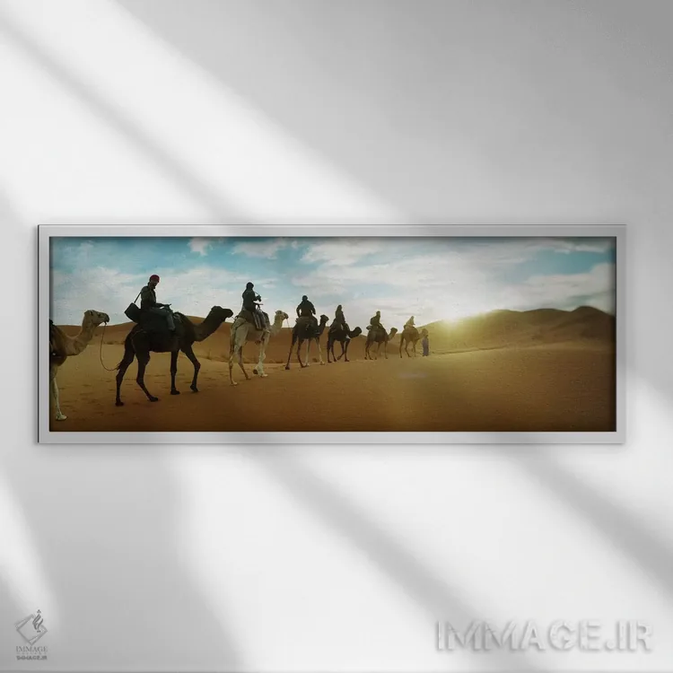 تابلو دکوراتیو Morocco #2,توریست ها سواره بر شتر از میان چشم انداز صحر… اثر پانورامیک ایمجز - نمای قابدار سفید