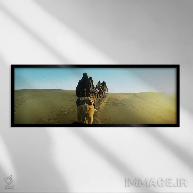 تابلو دکوراتیو Sahara Desert, Morocco,ردیفی از افراد سوار بر شتر در صح… اثر پانورامیک ایمجز - نمای قابدار مشکی