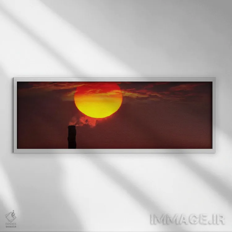 تابلو دکوراتیو دودکش صنعتی در غروب آفتاب اثر پانورامیک ایمجز - نمای قابدار سفید